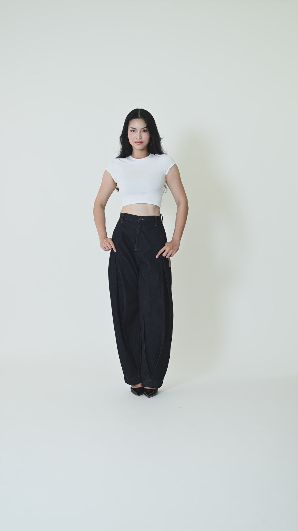 THE GIA · CURVED PLEAT