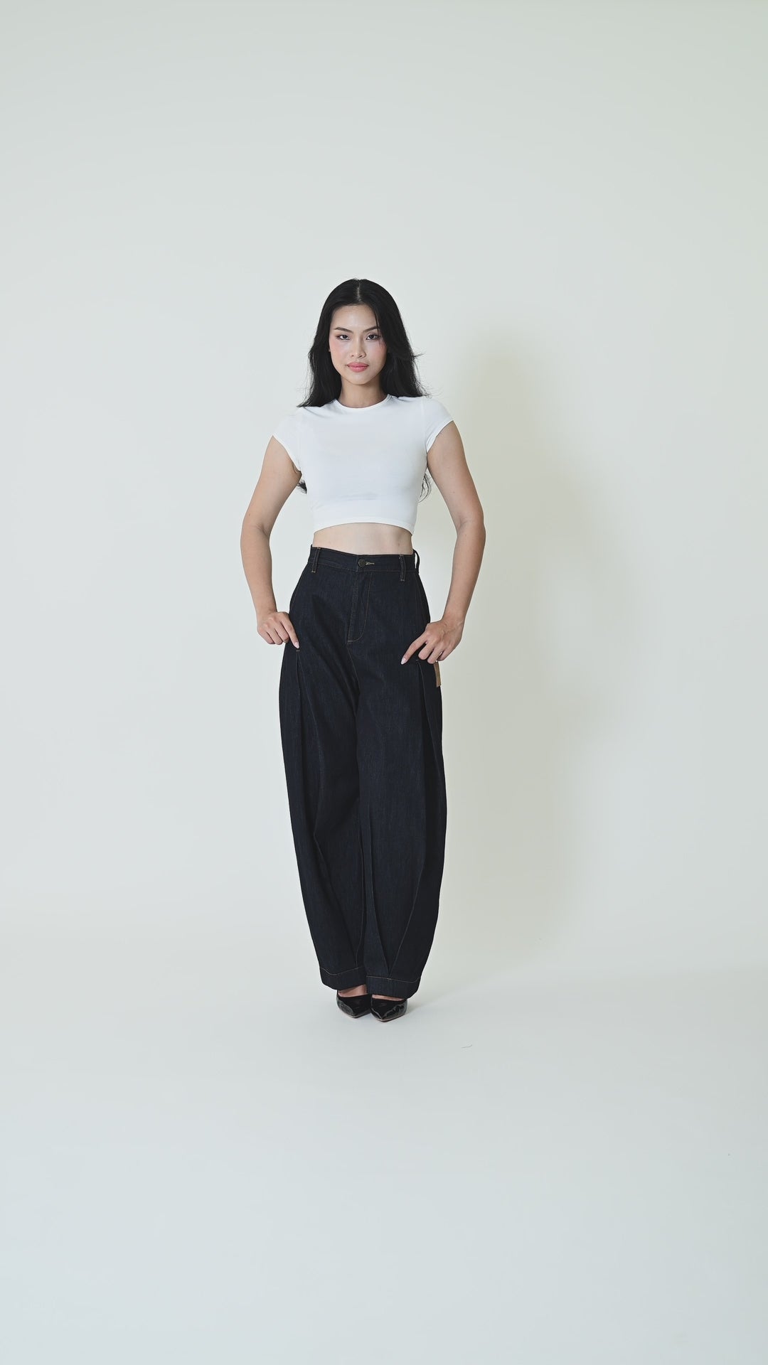 THE GIA · CURVED PLEAT